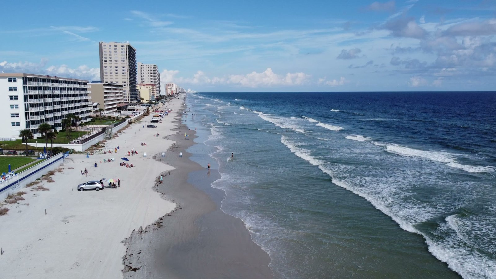 Aerial view of Jacksonville Beaches coastline, Atlantic Ocean surf, and coastal homes in Northeast Florida